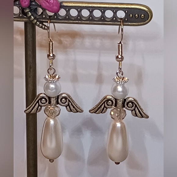 Earrings: Ivory tear drop pearl Angel on silver earwires. - Picture 2 of 5